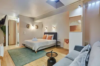Un ou plusieurs lits dans un hébergement de l'établissement Residence centre de Paris by Studio prestige