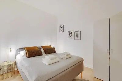 Un ou plusieurs lits dans un hébergement de l'établissement Welcoming apartment - 2BR-4P - Arc de Triomphe