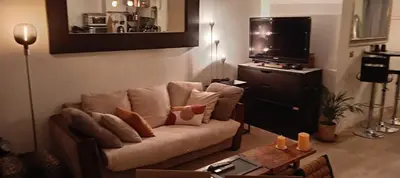 Coin salon dans l'établissement Magnifique Loft 65m en Open Space