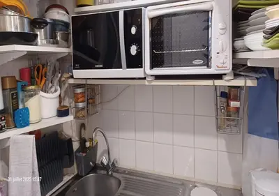 Cuisine ou kitchenette dans l'établissement Le Cardinal Le Moine