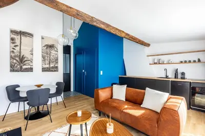 Coin salon dans l'établissement GuestReady - Serene stay near Champs de Mars