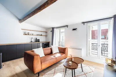Coin salon dans l'établissement GuestReady - Serene stay near Champs de Mars