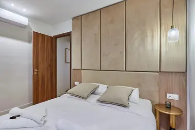 Un ou plusieurs lits dans un hébergement de l'établissement Superb Apartment Center of Paris by Studio Prestige
