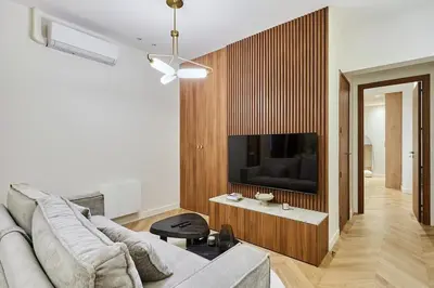 Télévision ou salle de divertissement dans l'établissement Superb Apartment Center of Paris by Studio Prestige