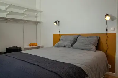 Un ou plusieurs lits dans un hébergement de l'établissement Cosy one bedroom close to Paris & Stade de France