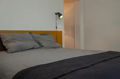 Un ou plusieurs lits dans un hébergement de l'établissement Cosy one bedroom close to Paris & Stade de France