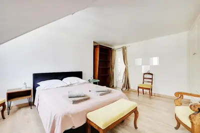 Un ou plusieurs lits dans un hébergement de l'établissement COSY 2 pièces INVALIDES BON MARCHE