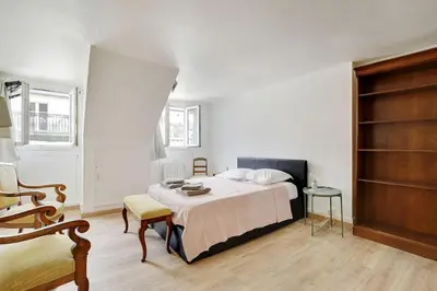 Un ou plusieurs lits dans un hébergement de l'établissement COSY 2 pièces INVALIDES BON MARCHE