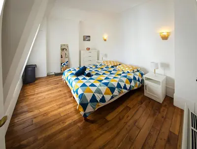Un ou plusieurs lits dans un hébergement de l'établissement Welcome to Paris