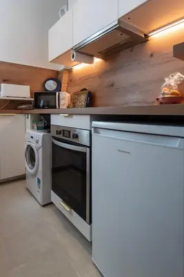 Cuisine ou kitchenette dans l'établissement Welcome to Paris