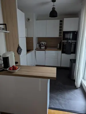 Cuisine ou kitchenette dans l'établissement Prox Stade France appart 2P Chaleureux
