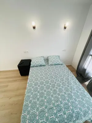 Un ou plusieurs lits dans un hébergement de l'établissement S6 Bel Appartement 10min centre paris stade de France