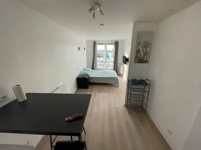 Un ou plusieurs lits dans un hébergement de l'établissement S6 Bel Appartement 10min centre paris stade de France