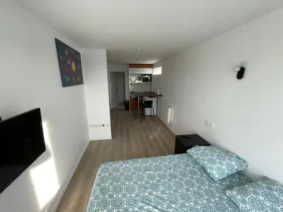 Un ou plusieurs lits dans un hébergement de l'établissement S6 Bel Appartement 10min centre paris stade de France