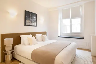 Un ou plusieurs lits dans un hébergement de l'établissement Pick A Flat's Apartements with services in Louvre - Rue des Halles