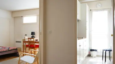 Un ou plusieurs lits dans un hébergement de l'établissement Paris Apartment Close to Eiffel Tower and Metro