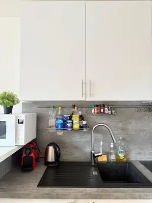 Cuisine ou kitchenette dans l'établissement Chic Modern Studio Steps from Luxembourg Gardens Henri Barbusse