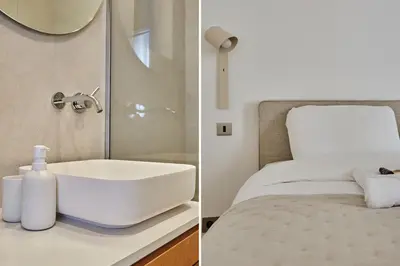 Un ou plusieurs lits dans un hébergement de l'établissement Amazing 2 bedrooms Apartment Paris Center by Studio Prestige