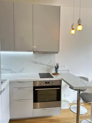 Cuisine ou kitchenette dans l'établissement Spacious apartment near Eiffel Grenelle F2