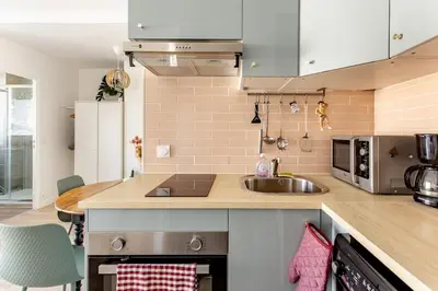 Cuisine ou kitchenette dans l'établissement Studio 119