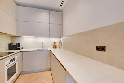 Cuisine ou kitchenette dans l'établissement Luxury apartment with AC - GeorgeV-Champs Elysees