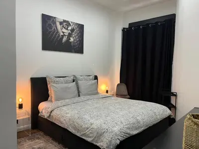 Un ou plusieurs lits dans un hébergement de l'établissement Paris Incredible Olympic Nest