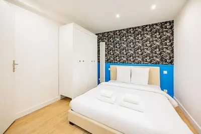Un ou plusieurs lits dans un hébergement de l'établissement Appart 8pers # 3 Bedrooms # Pereire # Paris 17