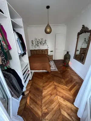 Un ou plusieurs lits dans un hébergement de l'établissement Appt de charme - Paris 15 eme