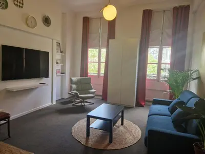 Télévision ou salle de divertissement dans l'établissement Le Circus