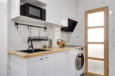 Cuisine ou kitchenette dans l'établissement 121 - 4 Personnes Jeux Olympiques Stade de France