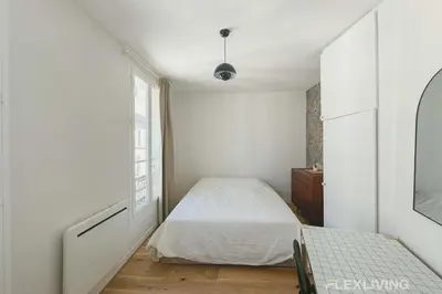 Un ou plusieurs lits dans un hébergement de l'établissement Flexliving - Studio - Durantin