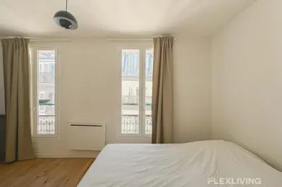Un ou plusieurs lits dans un hébergement de l'établissement Flexliving - Studio - Durantin