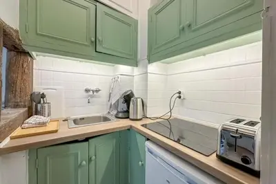 Cuisine ou kitchenette dans l'établissement Flexliving - Studio - Linné
