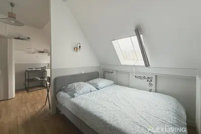 Un ou plusieurs lits dans un hébergement de l'établissement Flexliving - Studio near Eiffel Tower Invalides & Left Bank