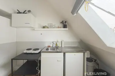Cuisine ou kitchenette dans l'établissement Flexliving - Studio near Eiffel Tower Invalides & Left Bank