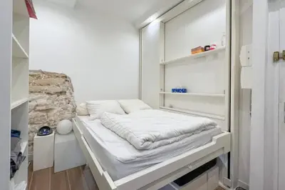Un ou plusieurs lits dans un hébergement de l'établissement Flexliving - Studio - Gérard