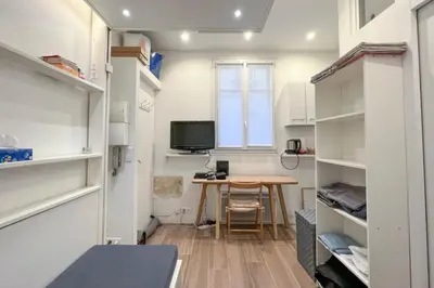 Télévision ou salle de divertissement dans l'établissement Flexliving - Studio - Gérard