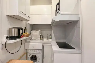 Cuisine ou kitchenette dans l'établissement Flexliving - Studio - Gérard