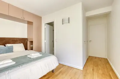 Un ou plusieurs lits dans un hébergement de l'établissement Superb Flat with Balcony - Near Notre-Dame - Paris 05