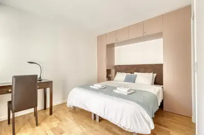 Un ou plusieurs lits dans un hébergement de l'établissement Superb Flat with Balcony - Near Notre-Dame - Paris 05