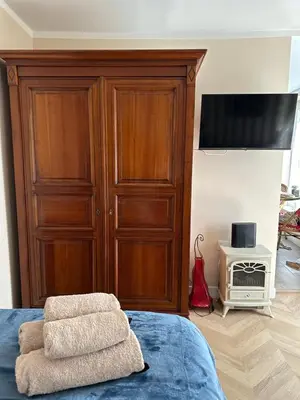 Télévision ou salle de divertissement dans l'établissement Évasion Parisienne !