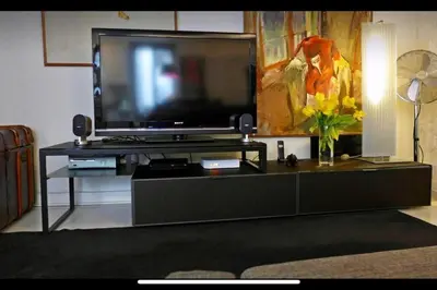 Télévision ou salle de divertissement dans l'établissement Large Studio North Marais