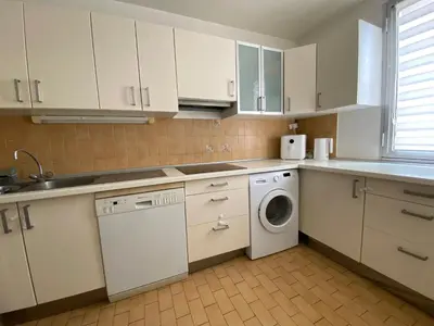 Cuisine ou kitchenette dans l'établissement Appartement spacieux Paris Vanves Parc des expositions