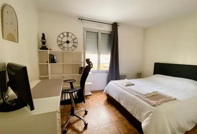 Un ou plusieurs lits dans un hébergement de l'établissement Appartement spacieux Paris Vanves Parc des expositions