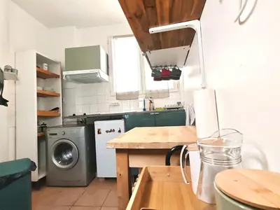 Cuisine ou kitchenette dans l'établissement 3 Pièces près de Paris - Métro 4
