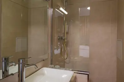 Salle de bains dans l'établissement Hotel Marena