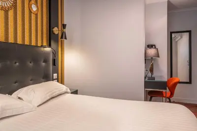 Un ou plusieurs lits dans un hébergement de l'établissement Hotel Marena
