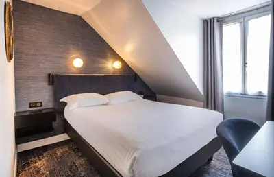 Un ou plusieurs lits dans un hébergement de l'établissement Hotel Marena