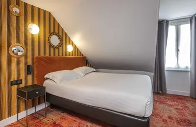 Un ou plusieurs lits dans un hébergement de l'établissement Hotel Marena