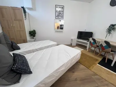 Un ou plusieurs lits dans un hébergement de l'établissement Studio proche du stade de France